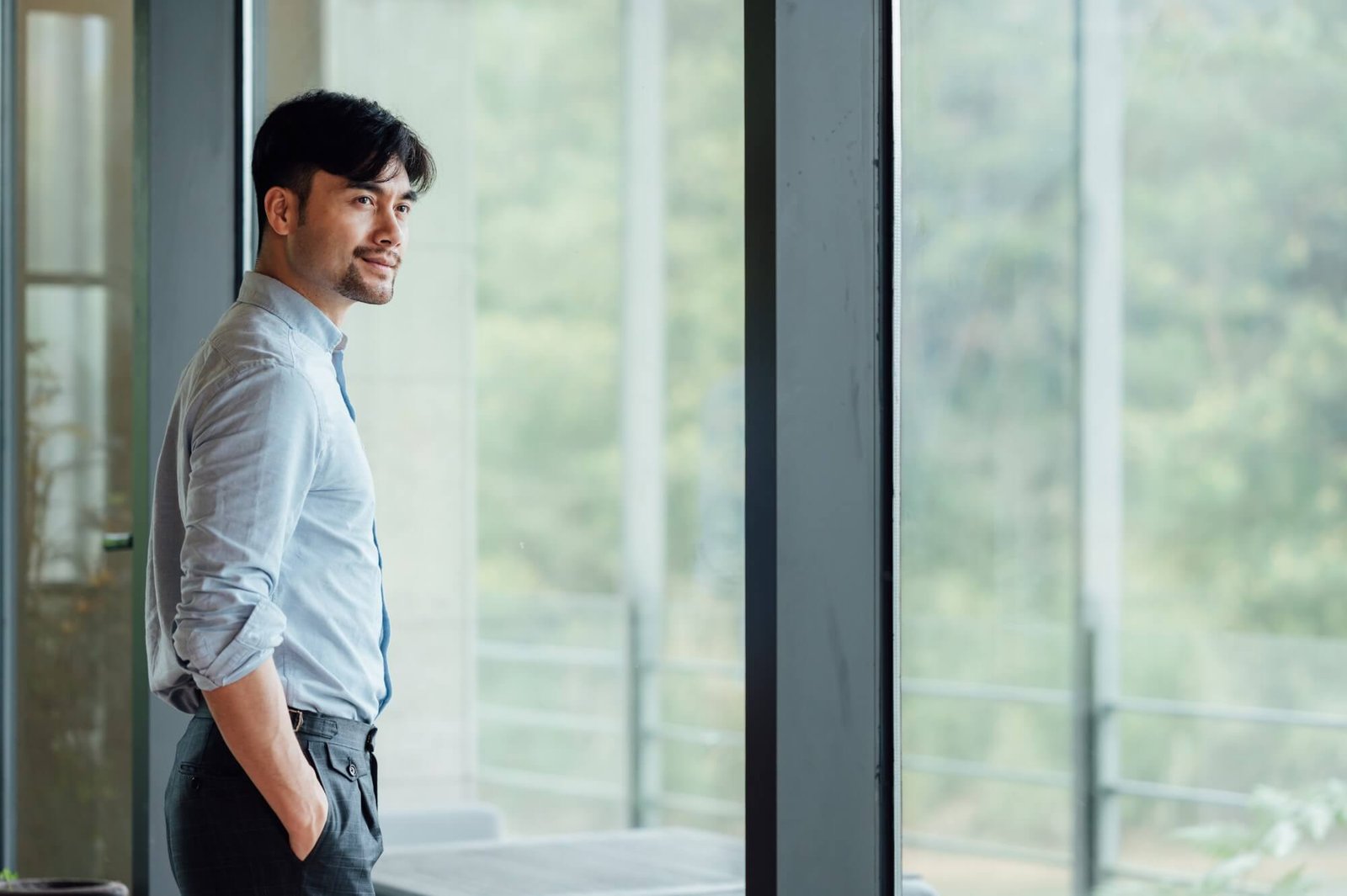 Asian businessman standing at office window, 2024 09 21 20 01 30 UTC, Custom 1