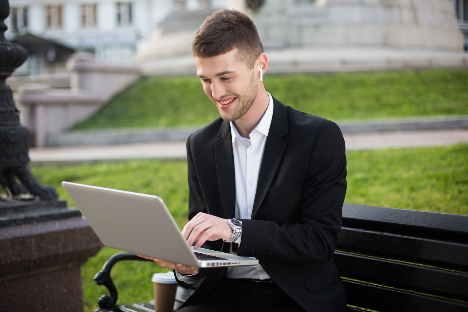 Young smiling businessman in classic black jacket, 2024 10 18 10 03 43 UTC, Custom 1